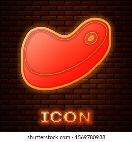 Glowing neon Steak meat icon isolated on brick wall background.  Vector Illustration