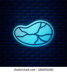 Glowing neon Steak meat icon isolated on brick wall background.  Vector Illustration