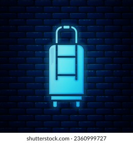 Glowing neon Suitcase for travel icon isolated on brick wall background. Traveling baggage sign. Travel luggage icon.  Vector Illustration
