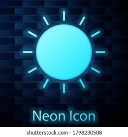 Glowing neon Sun icon isolated on brick wall background. Summer symbol. Good sunny day. Vector Illustration
