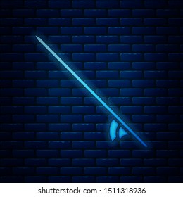 Glowing neon Surfboard icon isolated on brick wall background. Surfing board. Extreme sport. Sport equipment.  Vector Illustration