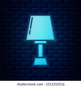 Glowing neon Table lamp icon isolated on brick wall background.  Vector Illustration