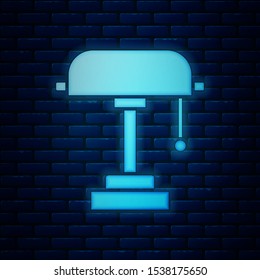Glowing neon Table lamp icon isolated on brick wall background.  Vector Illustration