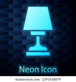 Glowing neon Table lamp icon isolated on brick wall background.  Vector