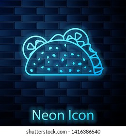 Glowing neon Taco with tortilla icon isolated on brick wall background. Traditional mexican fast food. Vector Illustration