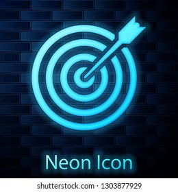 Glowing neon Target with arrow icon isolated on brick wall background. Dart board sign. Archery board icon. Dartboard sign. Business goal concept. Vector Illustration