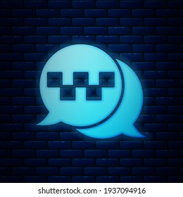 Glowing neon Taxi call telephone service icon isolated on brick wall background. Speech bubble symbol. Taxi for smartphone.  Vector