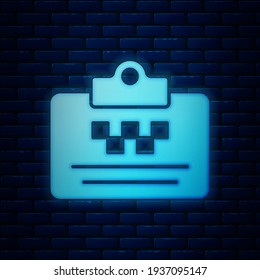 Glowing neon Taxi driver license icon isolated on brick wall background.  Vector