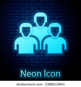 Glowing neon Team of baseball players icon isolated on brick wall background.  Vector