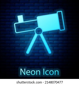 Glowing neon Telescope icon isolated on brick wall background. Scientific tool. Education and astronomy element, spyglass and study stars. Vector