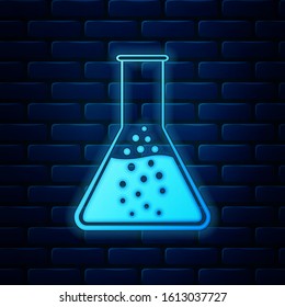 Glowing neon Test tube and flask - chemical laboratory test icon isolated on brick wall background.  Vector Illustration