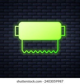 Glowing neon Textile fabric roll icon isolated on brick wall background. Roll, mat, rug, cloth, carpet or paper roll icon.  Vector