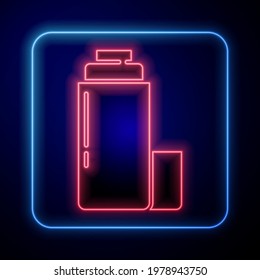 Glowing neon Thermos container icon isolated on blue background. Thermo flask icon. Camping and hiking equipment.  Vector