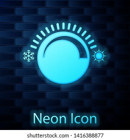 Glowing neon Thermostat icon isolated on brick wall background. Temperature control. Vector Illustration