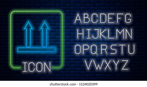 Glowing neon This side up icon isolated on brick wall background. Two arrows indicating top side of packaging. Cargo handled so these arrows always point up. Neon light alphabet. Vector Illustration