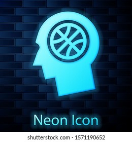 Glowing neon Thoughts on a basketball icon isolated on brick wall background.  Vector Illustration
