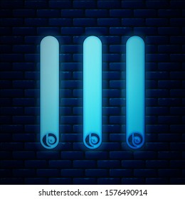 Glowing neon Three rolled sticks of cinnamon icon isolated on brick wall background. Aromatic spice. Condiment for dishes. Cooking theme.  Vector Illustration