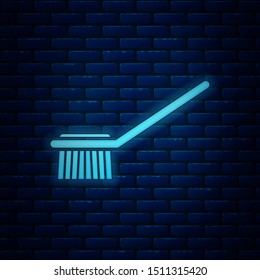 Glowing neon Toilet brush icon isolated on brick wall background.  Vector Illustration