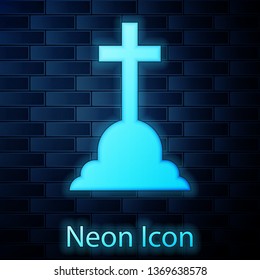 Glowing neon Tombstone with cross icon isolated on brick wall background. Grave icon. Vector Illustration