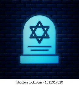 Glowing neon Tombstone with star of david icon isolated on brick wall background. Jewish grave stone. Gravestone icon.  Vector Illustration