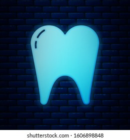Glowing neon Tooth icon isolated on brick wall background. Tooth symbol for dentistry clinic or dentist medical center and toothpaste package.  Vector Illustration