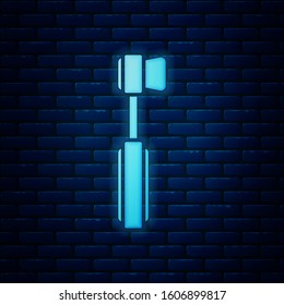 Glowing neon Toothbrush icon isolated on brick wall background.  Vector Illustration