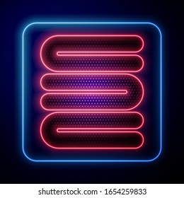 Glowing neon Towel stack icon isolated on blue background.  Vector Illustration