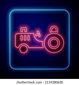 Glowing neon Tractor icon isolated on blue background.  Vector