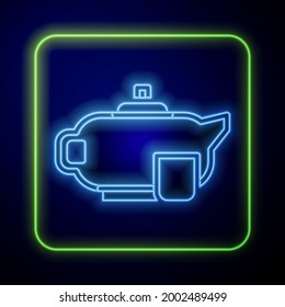 Glowing neon Traditional tea ceremony icon isolated on blue background. Teapot with cup.  Vector