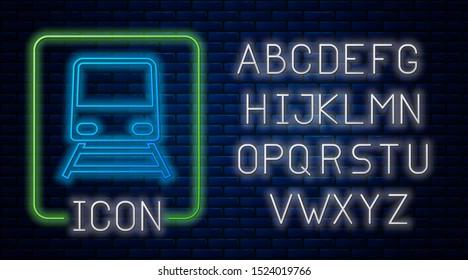 Glowing neon Train icon isolated on brick wall background. Public transportation symbol. Subway train transport. Metro underground. Neon light alphabet. Vector Illustration