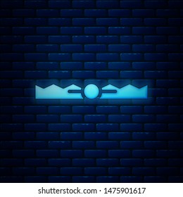 Glowing neon Trap hunting icon isolated on brick wall background.  Vector Illustration