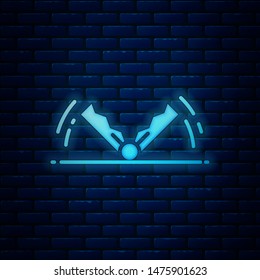 Glowing neon Trap hunting icon isolated on brick wall background.  Vector Illustration