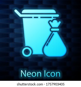 Glowing neon Trash can and garbage bag icon isolated on brick wall background. Garbage bin sign. Recycle basket icon. Office trash icon. Vector Illustration