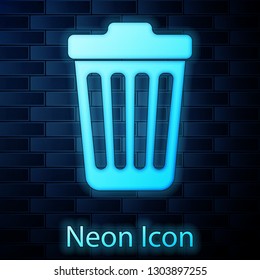 Glowing neon Trash can icon isolated on brick wall background. Garbage bin sign. Vector Illustration