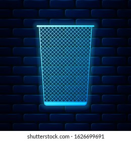 Glowing neon Trash can icon isolated on brick wall background. Garbage bin sign. Recycle basket icon. Office trash icon.  Vector Illustration