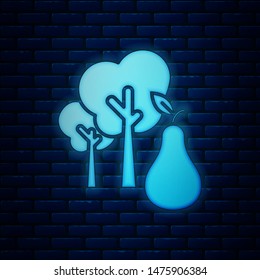 Glowing neon Tree with pears icon isolated on brick wall background. Agricultural plant. Organic farm product. Gardening theme.  Vector Illustration