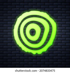 Glowing Neon Tree Rings Icon Isolated On Brick Wall Background. Wooden Cross Section.  Vector