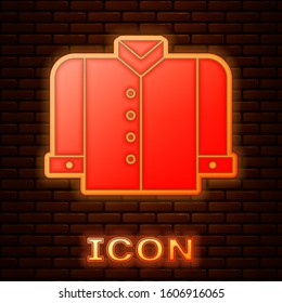 Glowing neon T-shirt icon isolated on brick wall background.  Vector Illustration