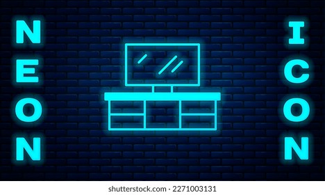 Glowing neon TV table stand icon isolated on brick wall background.  Vector