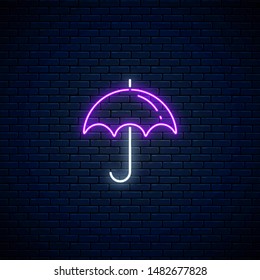 Glowing neon umbrella weather icon on dark brick wall background. Umbrella symbol in neon style to weather forecast in mobile application. Vector illustration.