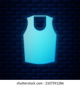 Glowing neon Undershirt icon isolated on brick wall background.  Vector