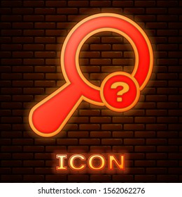 Glowing neon Unknown search icon isolated on brick wall background. Magnifying glass and question mark.  Vector Illustration