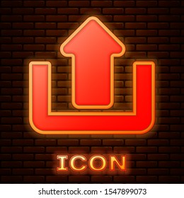 Glowing neon Upload icon isolated on brick wall background. Up arrow.  Vector Illustration