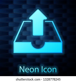Glowing neon Upload inbox icon isolated on brick wall background. Vector Illustration