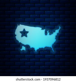 Glowing neon USA map icon isolated on brick wall background. Map of the United States of America.  Vector
