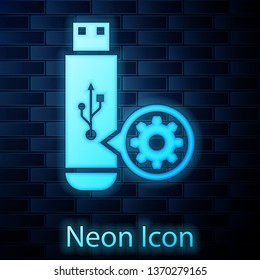 Glowing neon USB flash drive and gear icon isolated on brick wall background. Adjusting app, service concept, setting options, maintenance, repair, fixing. Vector Illustration