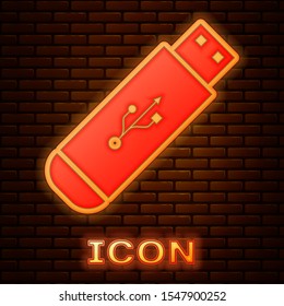 Glowing neon USB flash drive icon isolated on brick wall background.  Vector Illustration