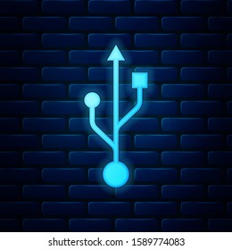 Glowing neon USB symbol icon isolated on brick wall background. Usb flash drive symbol.  Vector Illustration