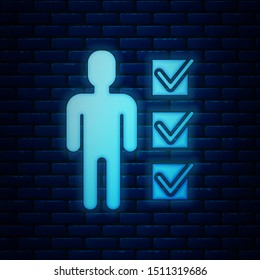 Glowing neon User of man in business suit icon isolated on brick wall background. Business avatar symbol user profile icon. Male user sign.  Vector Illustration