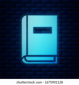 Glowing neon User manual icon isolated on brick wall background. User guide book. Instruction sign. Read before use.  Vector Illustration